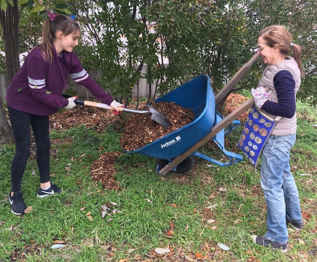 Volunteers working with mulch at BIP